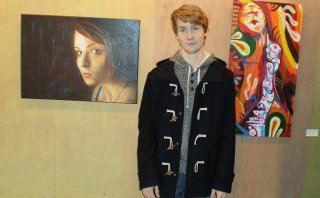 Sigurður Heimir Guðjónsson við verk sín.