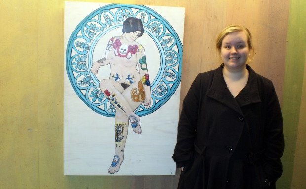 Dagbjört Guðjónsdóttir við mynd sína.